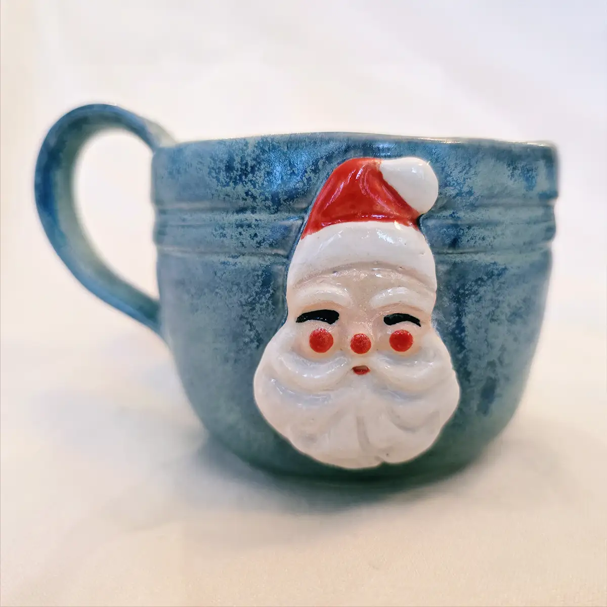 Aunt Chick’s™ MIni Jolly Santa Mug in Blue Texture