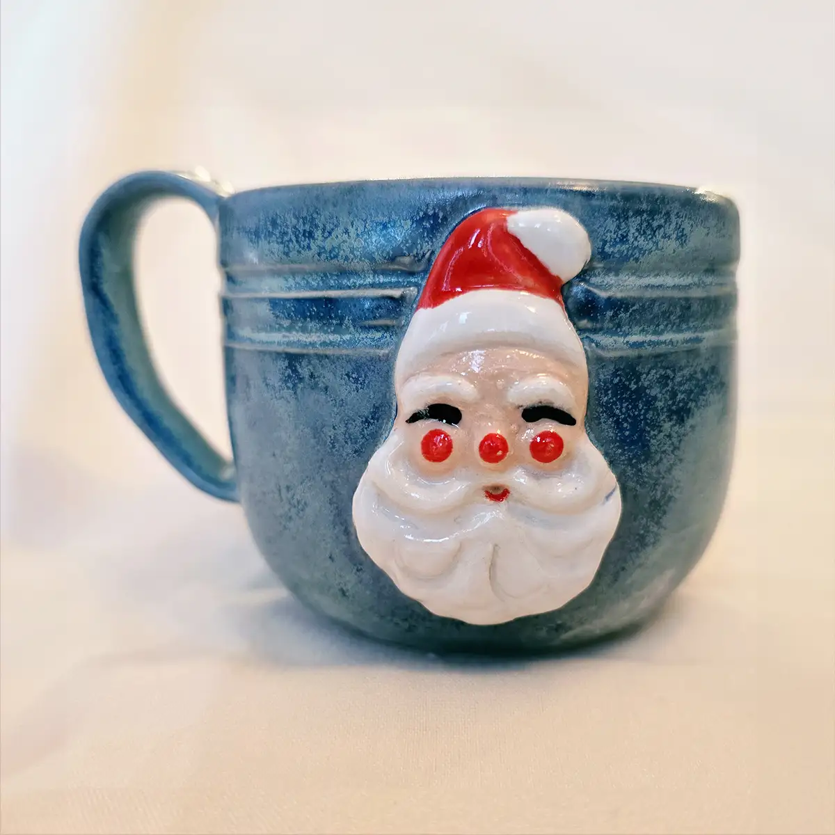 Aunt Chick’s™ MIni Jolly Santa Mug in Blue Texture