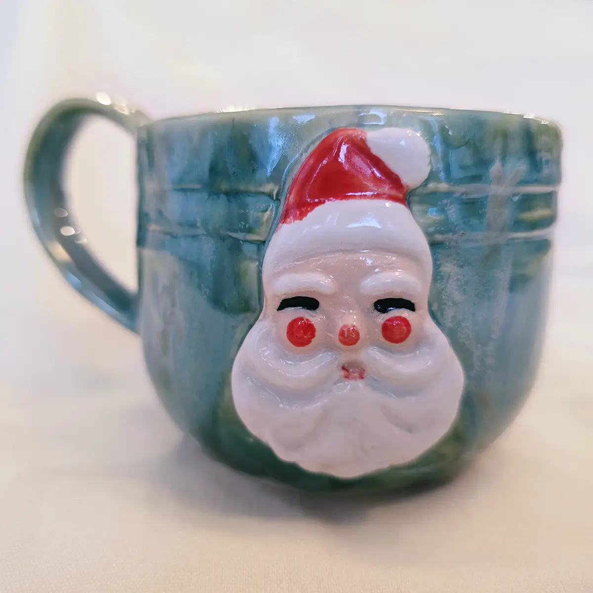 Aunt Chick’s™ MIni Jolly Santa Mug in Green